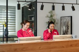 Women’s health clinic reception area with friendly staff at the front desk, Najat Hazimeh Clinic Dubai